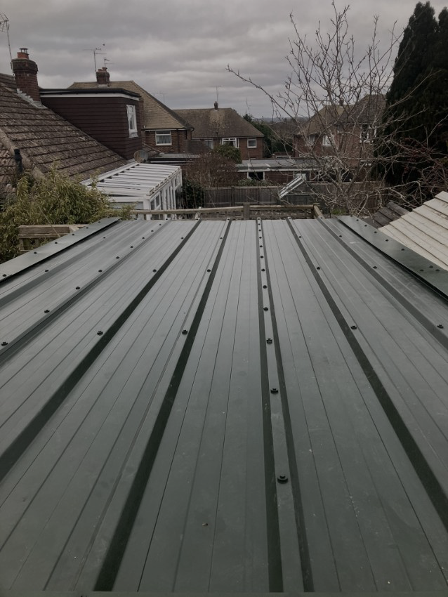 Installed steel garage roofing